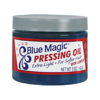 Blue Magic Pressing Oil Extra Light - pot bleu foncé avec étiquette rouge et blanche