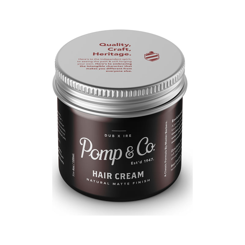 Pomp & Co. Hair Cream, pot marron avec couvercle sur le dessus et texte Quality Craft Heritage