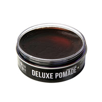 Uppercut Deluxe Pomade, open blik, inhoud zichtbaar